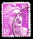 Postage stamp printed in France shows Marianne de Gandon, Precancelled serie, circa 1948