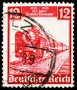 Postage stamp printed in German Realm shows Modern express locomotive, series 03, circa 1935
