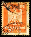 Postage stamp printed in German Realm shows New imperial eagle, Definitives serie, circa 1924