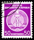 Postage stamp printed in Germany, Democratic Republic, shows Official Stamps for Administration Post B II and III, Hammer and