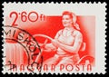 Postage stamp printed in Hungary shows Woman tractor driver, Hungarian Workers serie, circa 1955