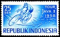 Postage stamp printed in Indonesia shows Racing Cyclist, Tour of Java Cycle Race serie, circa 1958