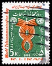 Postage stamp printed in Iran shows Winding lines, emblems, World Telecommunication Day serie, circa 1981