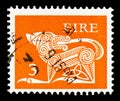 Postage stamp printed in Ireland shows Stylised Dog, 7th Century Brooch, Early Irish Art 1971-75 serie, circa 1975