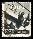 Postage stamp printed in Italy shows Hammer that breaks a chain, Democracy serie, 10 - Italian lira, circa 1945