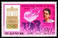 Postage stamp printed in Korea shows Cycling (Robert Charpentier), History of the Olympics - posters and gold medalist serie,