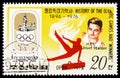 Postage stamp printed in Korea shows Gymnastics (Josep Stalder), History of the Olympics - posters and gold medalist serie, circa