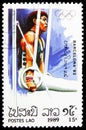 Postage stamp printed in Laos shows Gymnastics, Rings, Olympic Games 1992 - Barcelona serie, circa 1989