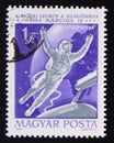 Postage stamp printed in magyar, hungary, 1965, cosmonaut A. Leonov in space Royalty Free Stock Photo