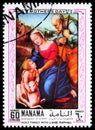 Postage stamp printed in Manama (Bahrain) shows Holy family with lamb, Paintings by Raphael serie, circa 1970