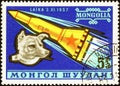 Postage stamp printed in Mongolia with the image of the astronaut dog Laika November 3, 1957. The first animal to orbit