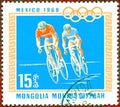 Postage stamp printed in Mongolia with a picture of a cyclists, with the inscription `Mexico 1968`