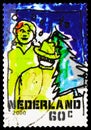 Postage stamp printed in Netherlands shows Buying a christmas tree, December Stamps serie, circa 2000