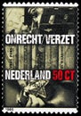 Postage stamp printed in Netherlands shows Facets of the War 1940-1945 Injustice and Resistance, Resistance and Liberation serie,