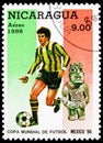 Postage stamp printed in Nicaragua shows Footballplayer Sculpture, FIFA World Cup 1986 - Mexico serie, 9 C$ - Nicaraguan cÃÂ³ Royalty Free Stock Photo