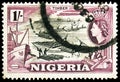 Postage stamp printed in Nigeria shows Rafts, Country motifs serie, 1 s - Nigerian shilling, circa 1953