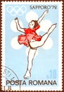 Postage stamp printed in Romania with the image of figure skater and the inscription `Sapporo, 72`