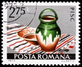 Postage stamp printed in Romania shows Pisc Pot and Dish, Romanian Ceramics serie, circa 1973