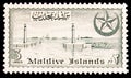 Postage stamp printed in shows Male Harbour, Views serie, 3 Maldivian laari, circa 1956