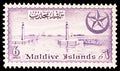 Postage stamp printed in shows Male Harbour, Views serie, 6 Maldivian laari, circa 1956 Royalty Free Stock Photo
