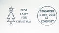 Postage stamp printed in Singapore shows Post early for Christmas, dated 2019