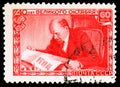 Postage stamp printed in Soviet Union shows Vladimir Lenin (Ulyanov) Reading the Newspaper \