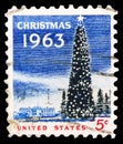 Postage stamp printed in United States shows National Christmas Tree and White House, Christmas serie, circa 1963 Royalty Free Stock Photo