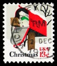 Postage stamp printed in United States shows Rural Mailbox, Christmas serie, 13 c - US cent, circa 1977