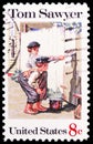 Postage stamp printed in United States shows Tom Sawyer by Norman Rockwell, American Folklore Issue serie, circa 1972 Royalty Free Stock Photo