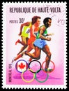 Postage stamp printed in Upper Volta (Burkina Faso) shows Long-distance running, Olympic Games serie, circa 1976