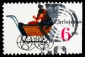 Postage stamp printed in USA shows Christmas - Doll Carriage, Christmas serie, circa 1970