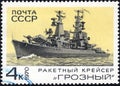 Postage stamp printed in USSR with a picture of a missile cruiser `Grozny`