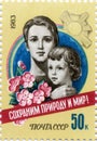 A postage stamp printed in USSR showing the child and mother