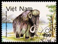 Postage stamp printed in Vietnam shows Wooly Mammoth Mammuthus primigenius, Fauna 1960 serie, circa 1991 Royalty Free Stock Photo