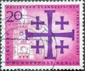 This postage stamp in purple shows the ruin of the GedÃÂ¤chtniskirche next to the Jerusalem Cross, the symbol
