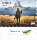 Postage stamp with Ukrainian border guard and russian warship