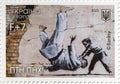 Postage stamp of the Ukrposhta with the image of graffiti with the judoka Banksy on Borodyanka