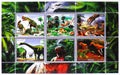 Postage stamps printed in Cinderellas shows Compsognathus and Diplodocus Mini sheet Dinosaurs, Togo serie, circa 2016