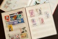 Postage stamps in a vintage album. Royalty Free Stock Photo