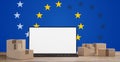 Postal packages next to a computer in front of creative abstract Europe stars background 3d-illustration
