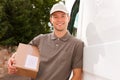 Postal service - delivery of a package Royalty Free Stock Photo