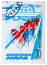 Postal stamp printed in USSR is shown by the Peace Race,Group of bicycle racers