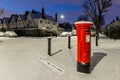 Postbox in snow in London suburb, UK