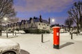 Postbox in snow in London suburb, UK