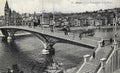 Postcard from around 19500 showing the pedestrian bridge la Passerelle Saucy and la Grand Poste de LiÃÂ¨ge building in the centre