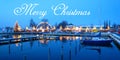 Postcard with a beautiful swiss christmas market in switzerland on the lake shore with snow covered ships at the blue hour