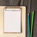 Postcard with Envelope and Pencils on Clipboard Royalty Free Stock Photo