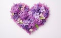 Postcard with a heart made of purple and lilac flowers, light background