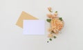 Postcard mockup whith flowers and envelope Royalty Free Stock Photo