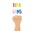 A postcard, a poster with colorful words Love will win. LGBT rainbow colors. Pride month concept. Clenched fist, hand. A